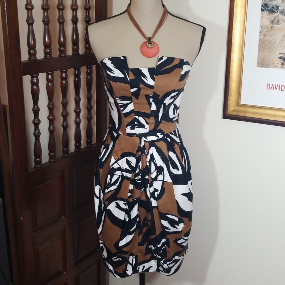 B.Smart pattern Strapless dress. Size 4